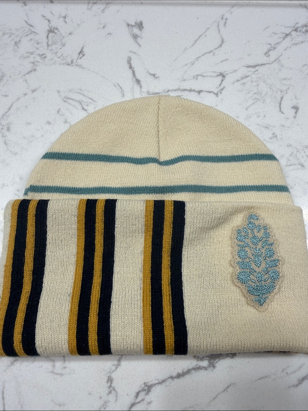 Cream Striped Knit Beanie with Teal Embroidery